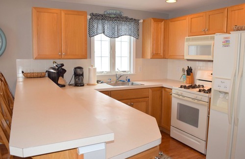 Townsend's Inlet House | Large deck off the living room with bay views. About 3 blocks to the beach.