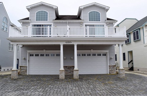 Townsend's Inlet House | Large deck off the living room with bay views. About 3 blocks to the beach.