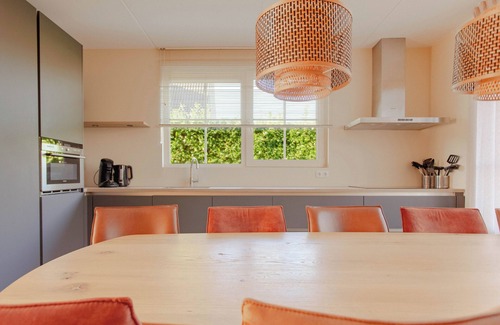 Makkum Cabin | Large group villa with a sauna, a whirlpool, and five bedrooms at the luxurious Beach Resort Makkum by the IJsselmeer.