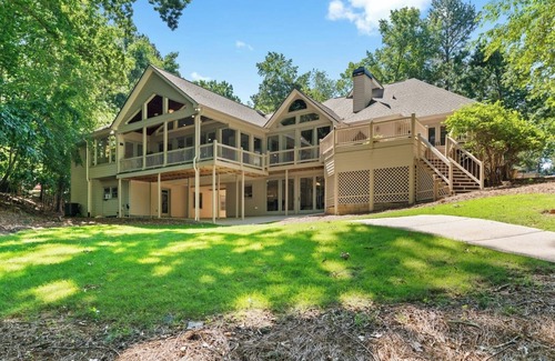 Flowery Branch House | Large Luxury Lake Home with Private Dock, Pet Friendly, Hot Tub