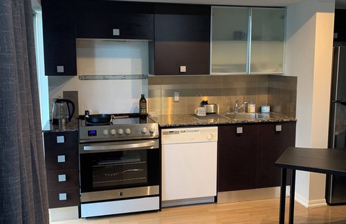 Bay Street Corridor Condo | Large studio with balcony on Bay & College in the heart of downtown Toronto