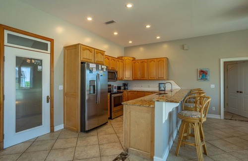 Plantation House | LOCATION, LOCATION, LOCATION! This charming house is next door to the Plantation Clubhouse with its large community pool, tennis courts, and fitness center.