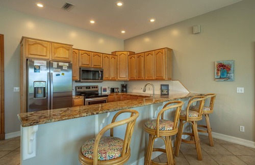 Plantation House | LOCATION, LOCATION, LOCATION! This charming house is next door to the Plantation Clubhouse with its large community pool, tennis courts, and fitness center.