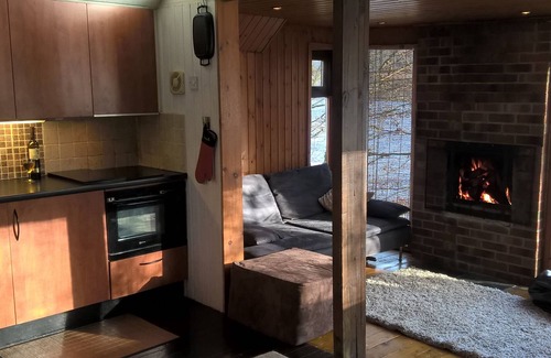 Lerags Ski Chalet | Lochside Chalet With Fireplace, Fantastic Mountain And Lake Views and Fishing.