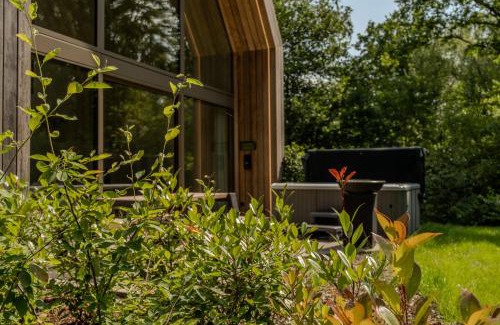 Zolder House | Lodge met Jacuzzi - 4 personen - Woodz Lodges