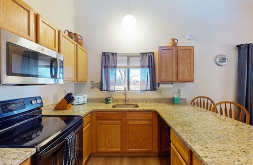 Pagosa Springs Condo | Lofty condo with patio - walk to golf, recreation center & eateries