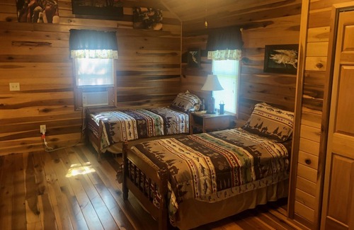 Farmers House | Lofty “Musky Cabin” situated on a hill with musky decor, fire ring, and 2 decks!