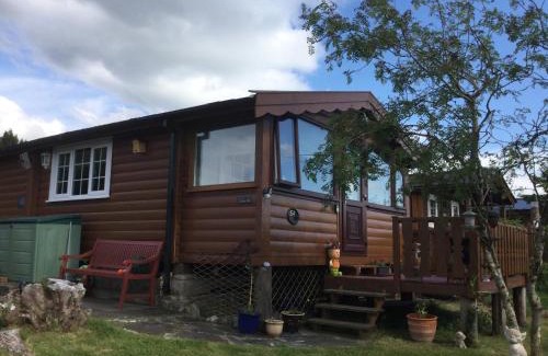 Bronaber House | Log cabin - free parking garden & pet friendly