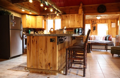 Prattsburgh House | Log Cabin Living in this rustic yet refined home with ample space and privacy!