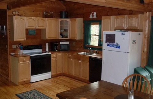 Fryeburg Cabin | Log Cabin on Spacious Lakeside Woodlands, with Private Beach and Waterfront.