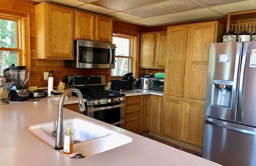 Au Train Cabin | Log Home Luxury awaits on the west shore of AuTrain Lake!