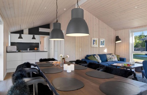 Nykøbing House | Look forward to a fantastic sandy beach near this inviting house with a large terrace.