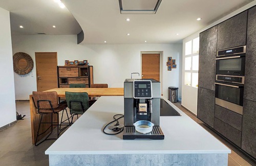 Roujan House | Look forward to an unforgettable vacation in this modern vacation home with pool.