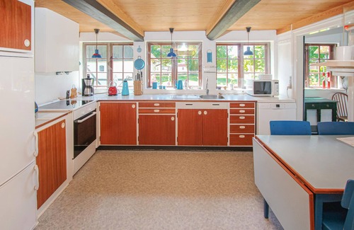 Samsø House | Look forward to an unforgettable family vacation in this thatched cottage.
