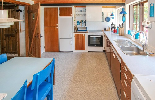 Samsø House | Look forward to an unforgettable family vacation in this thatched cottage.