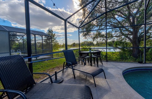 Haines City House | LOVELY 3 BDR Home @ ORLANDO with Heated POOL/LAKE view/Golf Course!