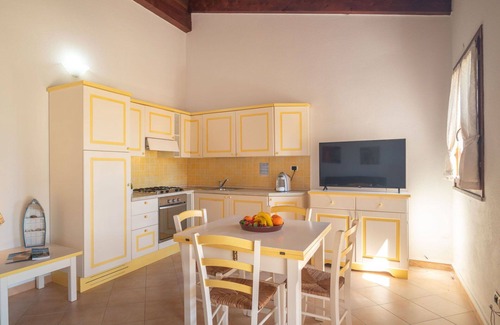 Porto Pozzo Apartment | Lovely apartment for 4 people with WIFI, A/C, TV, terrace, pets allowed and parking