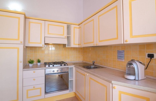 Porto Pozzo Apartment | Lovely apartment for 4 people with WIFI, A/C, TV, terrace, pets allowed and parking