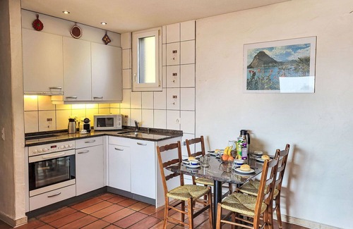 Sonvico Apartment | Lovely apartment for 4 guests with pool, WIFI, TV and patio