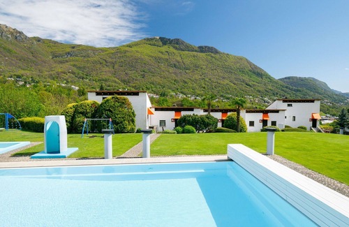 Sonvico Apartment | Lovely apartment for 4 guests with pool, WIFI, TV and patio