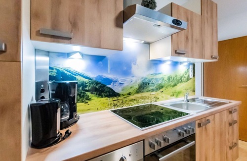 Taxenbach Apartment | Lovely apartment for 4 guests with WIFI, TV, balcony and panoramic view