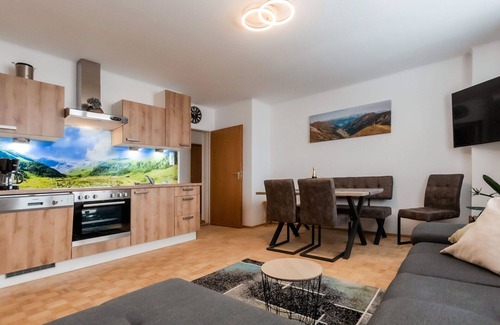 Taxenbach Apartment | Lovely apartment for 4 guests with WIFI, TV, balcony and panoramic view