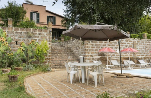 Corchiano Apartment | Lovely apartment for 8 people with WIFI, pool, TV, patio and pets allowed