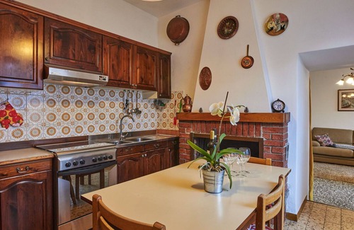 Porlezza House | Lovely apartment in villa for 4 guests with WIFI, pool, TV, patio and pets allowed