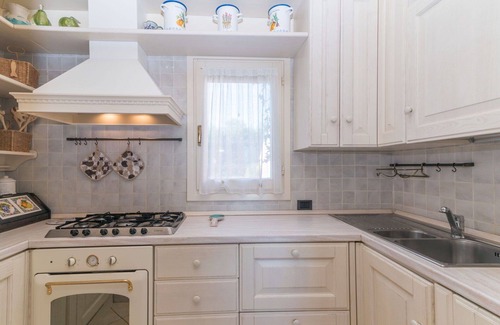 Baia Caddinas Apartment | Lovely apartment with WIFI, A/C, pool, TV, terrace, pets allowed, panoramic view and parking