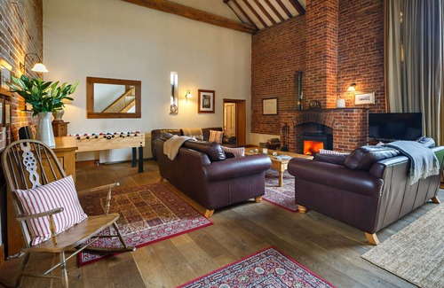 Reepham House | Lovely barn for celebrations; huge vaulted barn room, log burner, hot tub.
