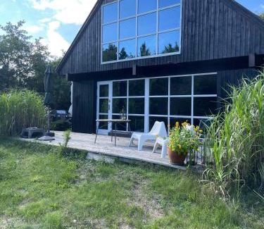 Øer Strand House | Lovely Beach Home Enveloped In Green Surroundings