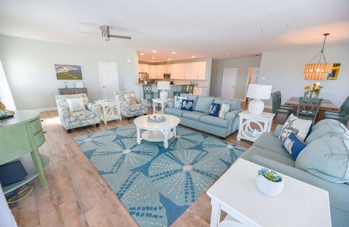 Long Neck House | Lovely home, wraparound porch, waterfront, pools, beach, pet friendly!