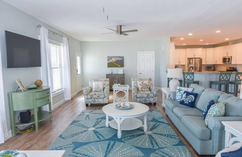 Long Neck House | Lovely home, wraparound porch, waterfront, pools, beach, pet friendly!