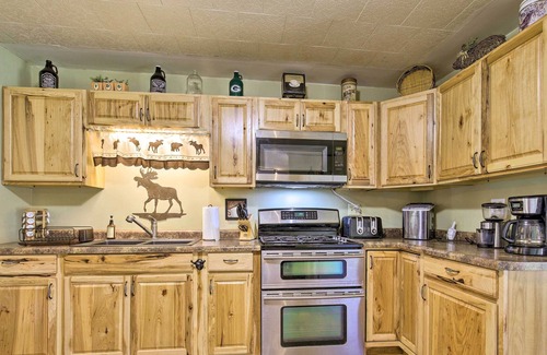 Eagle River Cottage | Lovely Lakefront Cottage w/ Fire Pit & Yard!