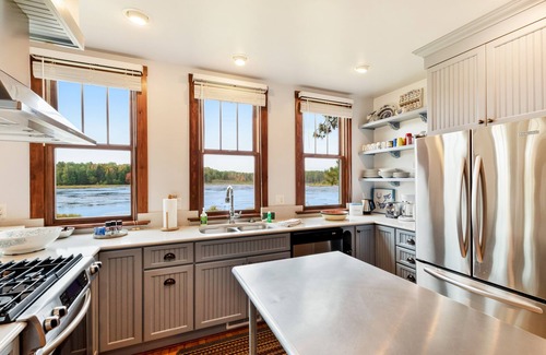 Presque Isle House | Lovingly restored, historic home on 160 acres w/game room & dock