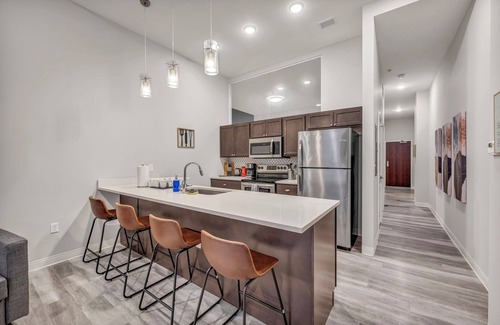 Gateway District Apartment | Luxe 1B in Heart of Downtown Pool & Spa Gym