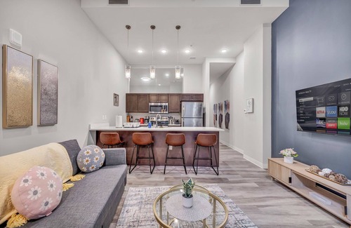 Gateway District Apartment | Luxe 1B in Heart of Downtown Pool & Spa Gym
