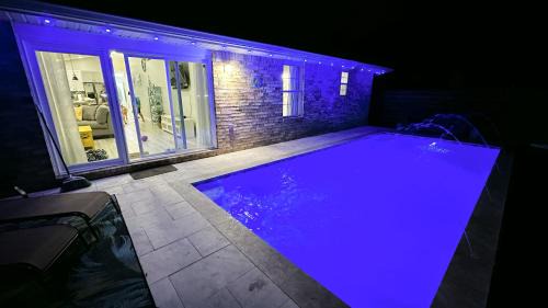 Miramar Beach House | Luxurious Beach House, Private heated pool, Dedicated office, Mins walk to Beach & shops