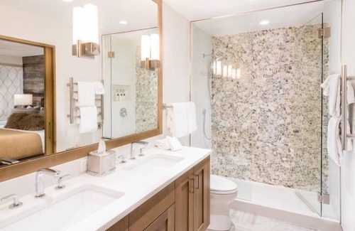 Aspen Hotel | Luxury 2 Bedroom Downtown Aspen Vacation Rental With Access to a Heated Pool, Hot Tubs, Game Room and Spa