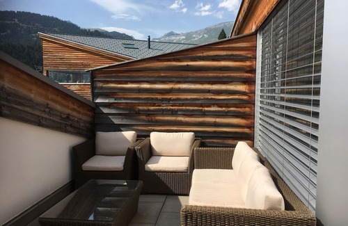 Laax Apartment | Luxury apartment, beautiful terrace (partly covered), free WIFI and parking