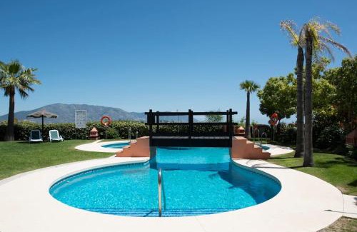 Ojen Apartment | Luxury apartment with sea views, golf, gym, spa, 7 pools