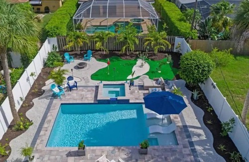 Naples Park House | Luxury Beach House Pool & Hot Tub Oasis