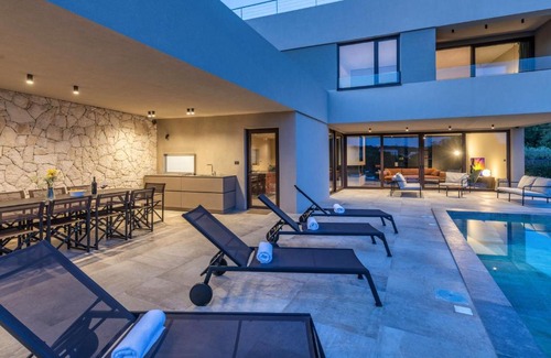 Banjole Villa | Luxury beachside villa with a pool and a sea view