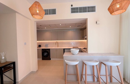 Abu Dhabi Apartment | Luxury Boho Retreat with Serene Lagoon Views