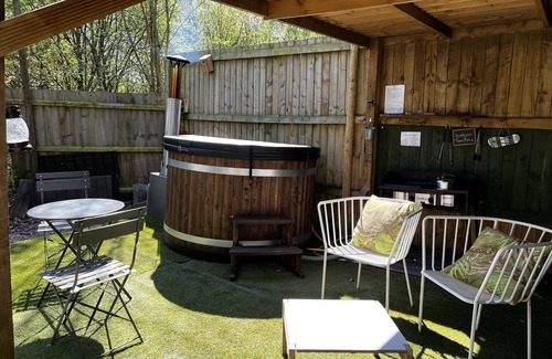 Priors Marston RV Rental | Luxury cosy tipi with Log burning Scandinavian hot tub. Perfect night