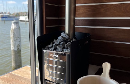 Monnickendam Boat Rental | Luxury Houseboat: "Liberdade" with sauna. Dinghy included.