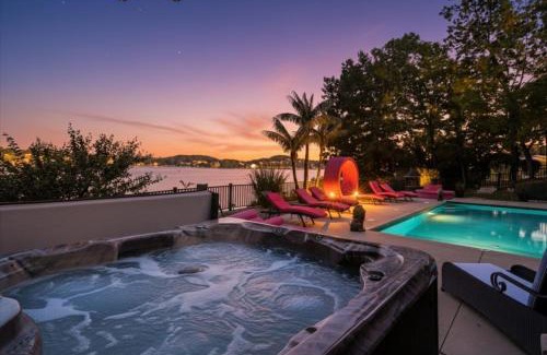Sunrise Beach House | Luxury Lakefront Escape w/Heated Pool, Hot Tub & Theater