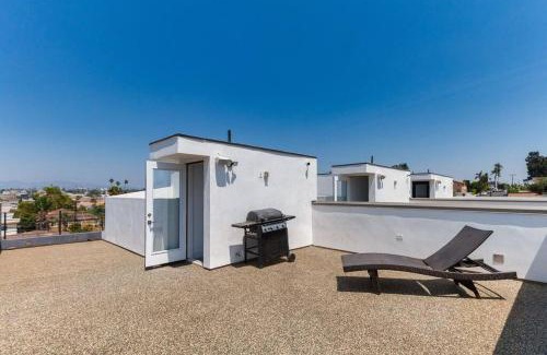 Mid City Villa | Luxury Modern 4 Bedroom 3 Bathroom Home with Rooftop Deck #2