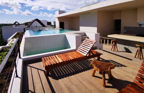 Ek Balam Village Apartment | Luxury New Apartment in exclusive Aldea Zama Tulum