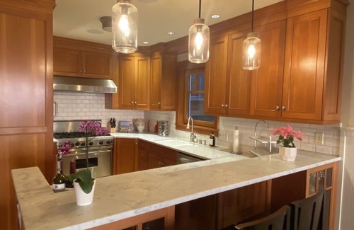 West Newport House | Luxury Oceanfront Home with Rooftop Deck, Hot Tub, Fire Pit